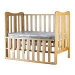 Durable wooden baby bed with classic design and safety features Elegant, Safe, and Made to Hug Their Sleep . Built to last for Egyptian families.