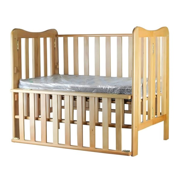 Durable wooden baby bed with classic design and safety features Elegant, Safe, and Made to Hug Their Sleep . Built to last for Egyptian families.